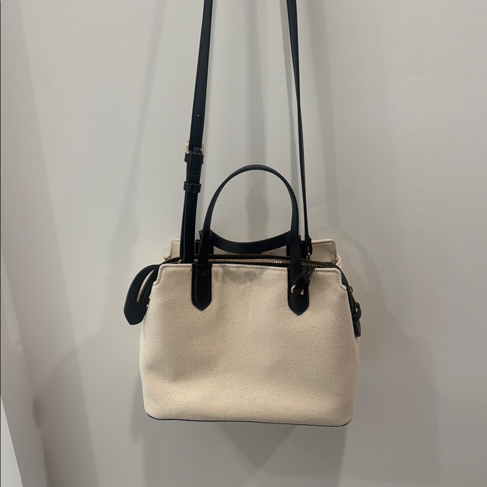 Elegant Cream and Black Handbag